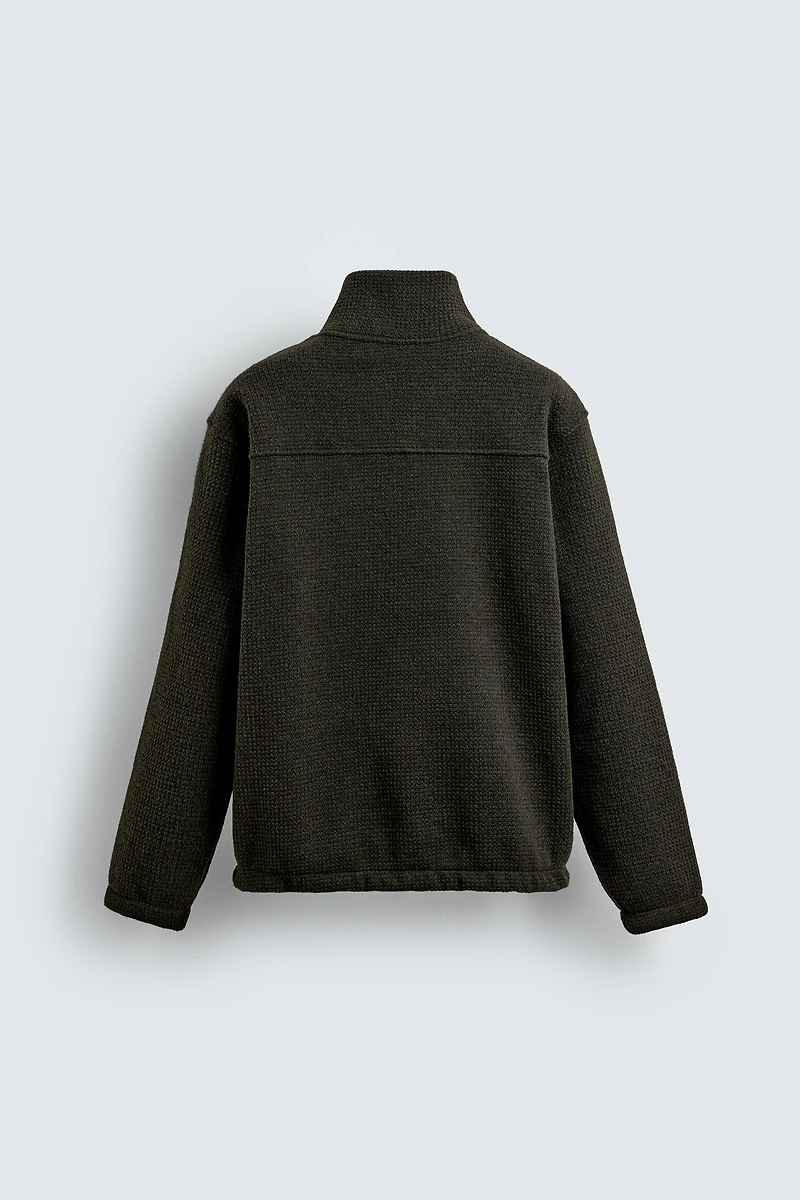 SWEAT STRUCTURÉ COL ZIPPÉ