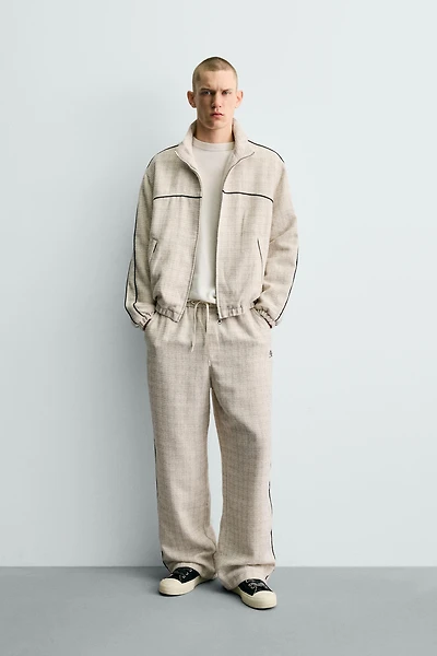 BLOUSON COUPE CARRÉE STRUCTURÉ LISERÉS CONTRASTANTS