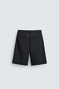 RELAXED FIT PLEATED SUIT SHORTS