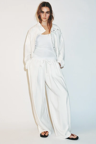 ADJUSTABLE HEM FLOWY PANTS