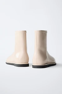 PATENT FINISH ANKLE BOOTS ECRU