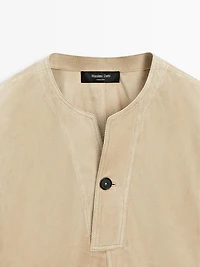 Blouse large en cuir finition daim