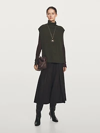 Sleeveless high neck sweater