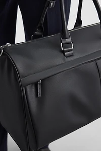 TEXTURED TRAVEL BAG