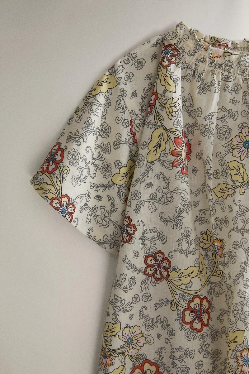 BABY FLORAL FOOTED ROMPER