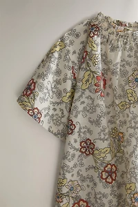 BABY FLORAL FOOTED ROMPER