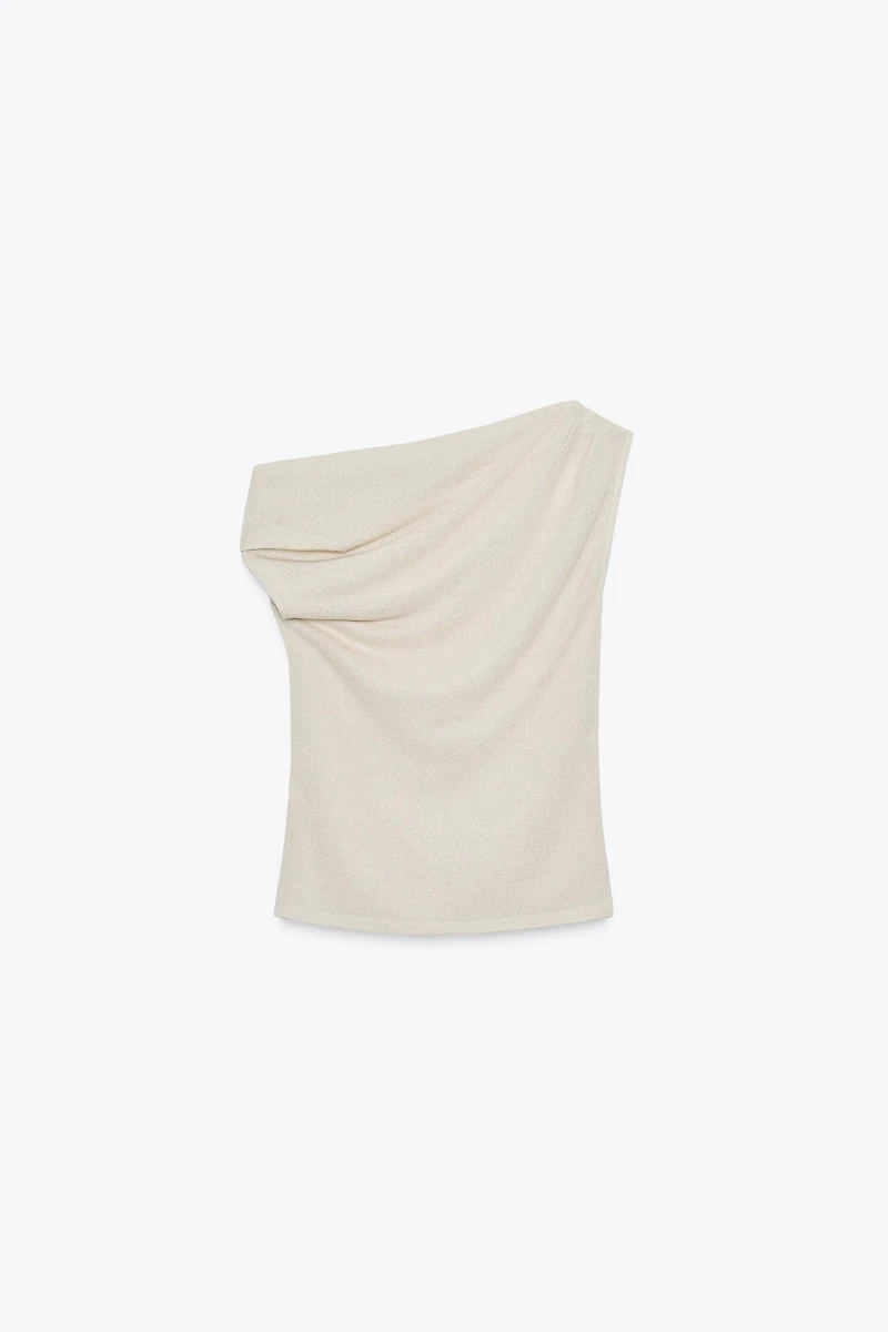 TOP ASYMÉTRIQUE EN MAILLE COUPÉE