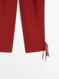 100% linen trousers with bow detail