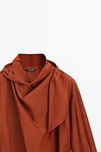 Flowing blouse with tie detail