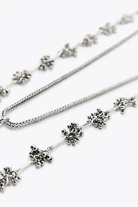 2-PACK NECKLACES WITH PIECES AND BOTTLE