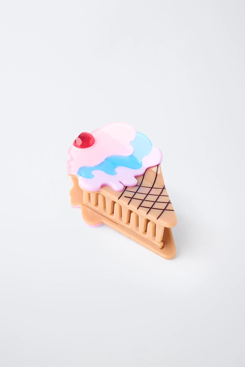 PINCE EN FORME DE GLACE