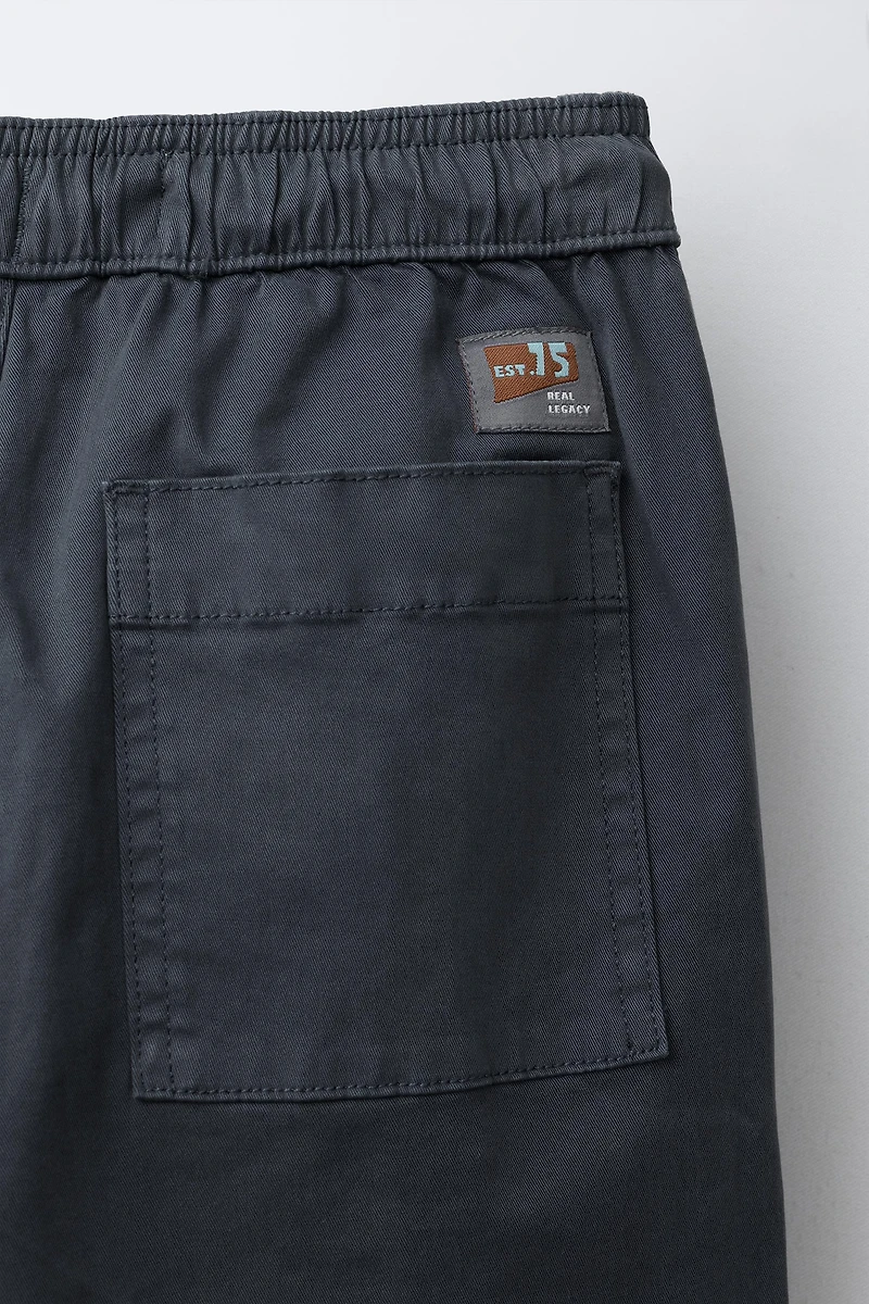 STRAIGHT LEG PANTS WITH LABEL