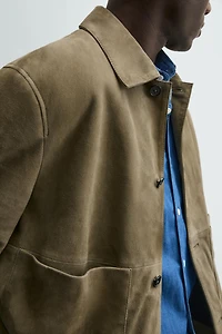 BLOUSON EN CUIR À POCHES