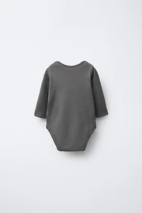 THREE-PACK OF SANTA, REINDEER, AND SNOWMAN BODYSUITS