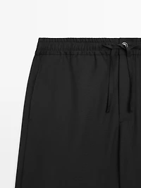 Relaxed fit wool trousers