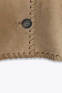VESTE EFFET DAIM FINITIONS TRESSÉES