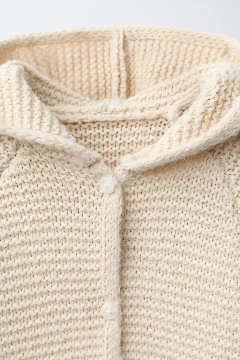 HOODED CHUNKY KNIT JUMPSUIT