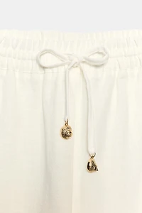 PANTALON DROIT À BANDE LATÉRALE