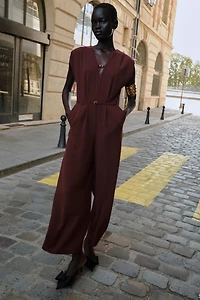 WIDE-LEG BELTED JUMPSUIT
