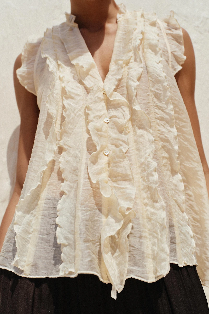SEMI-SHEER RUFFLED TOP