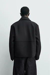 BLOUSON STRUCTURÉ À CHEVRON ET ZIP
