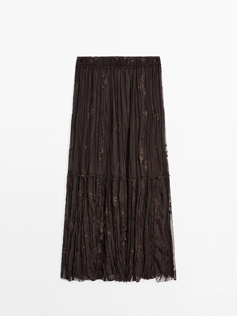 Long pleated skirt with embroidered detail