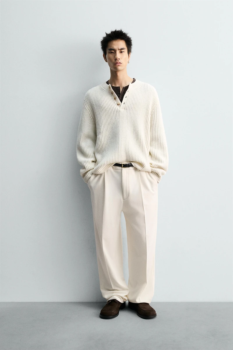 TEXTURED WEAVE HENLEY NECK SWEATER