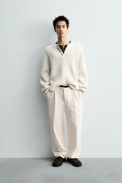 TEXTURED WEAVE HENLEY NECK SWEATER