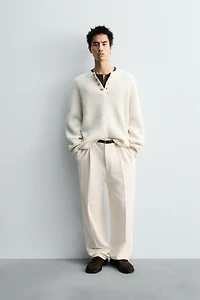 TEXTURED WEAVE HENLEY NECK SWEATER