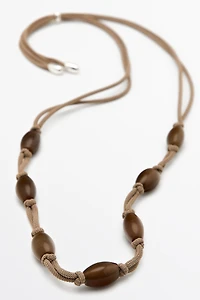 Gem-effect bead cord necklace