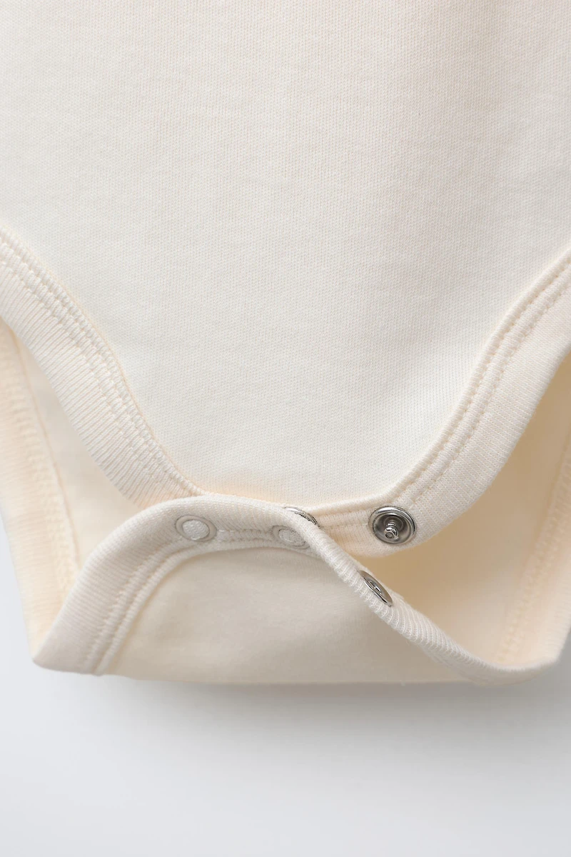 LOT DE TROIS BODYS PÈRE NOËL, RENNE ET BONHOMME NEIGE