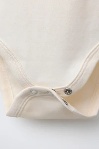 LOT DE TROIS BODYS PÈRE NOËL, RENNE ET BONHOMME NEIGE