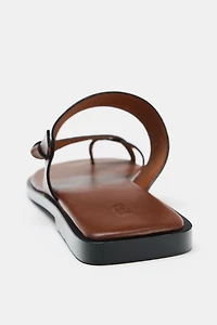 FLAT LEATHER STRAPPY SANDALS