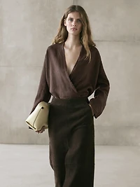 Flowing loose-fitting linen wrap blouse