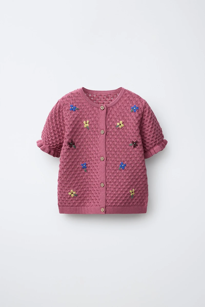 GILET EN MAILLE À FLEURS BRODÉES
