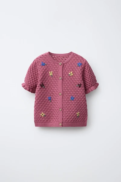 GILET EN MAILLE À FLEURS BRODÉES