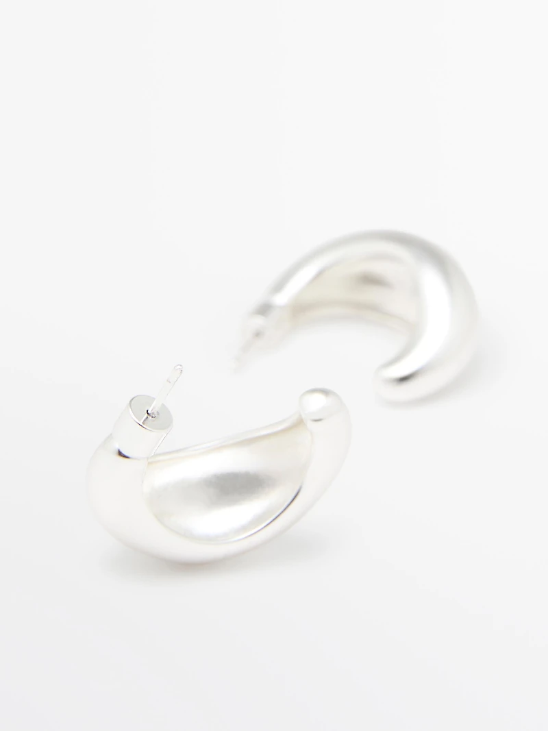 Half-moon hoop earrings