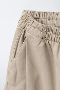 PANTALON BALLON À PLIS