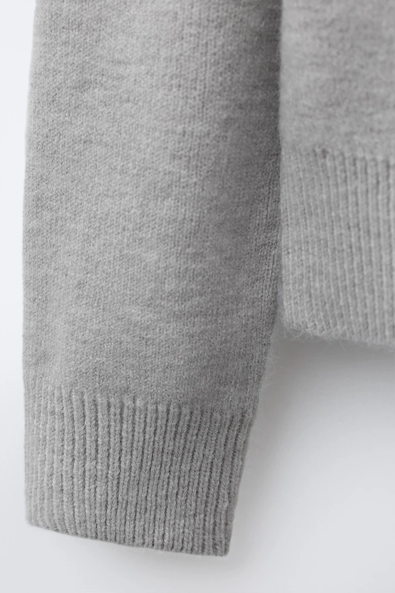 BOWS KNIT SWEATER