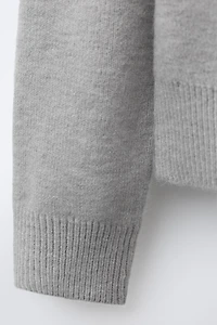 BOWS KNIT SWEATER