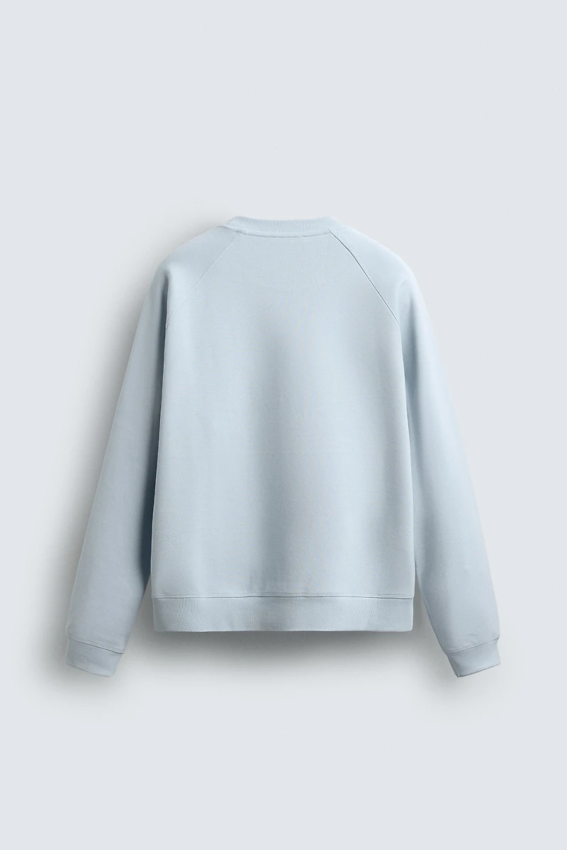 WASHED PIQUÉ TEXTURED SWEATSHIRT