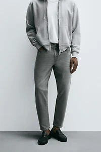 SLIM TAPERED FIT JEANS