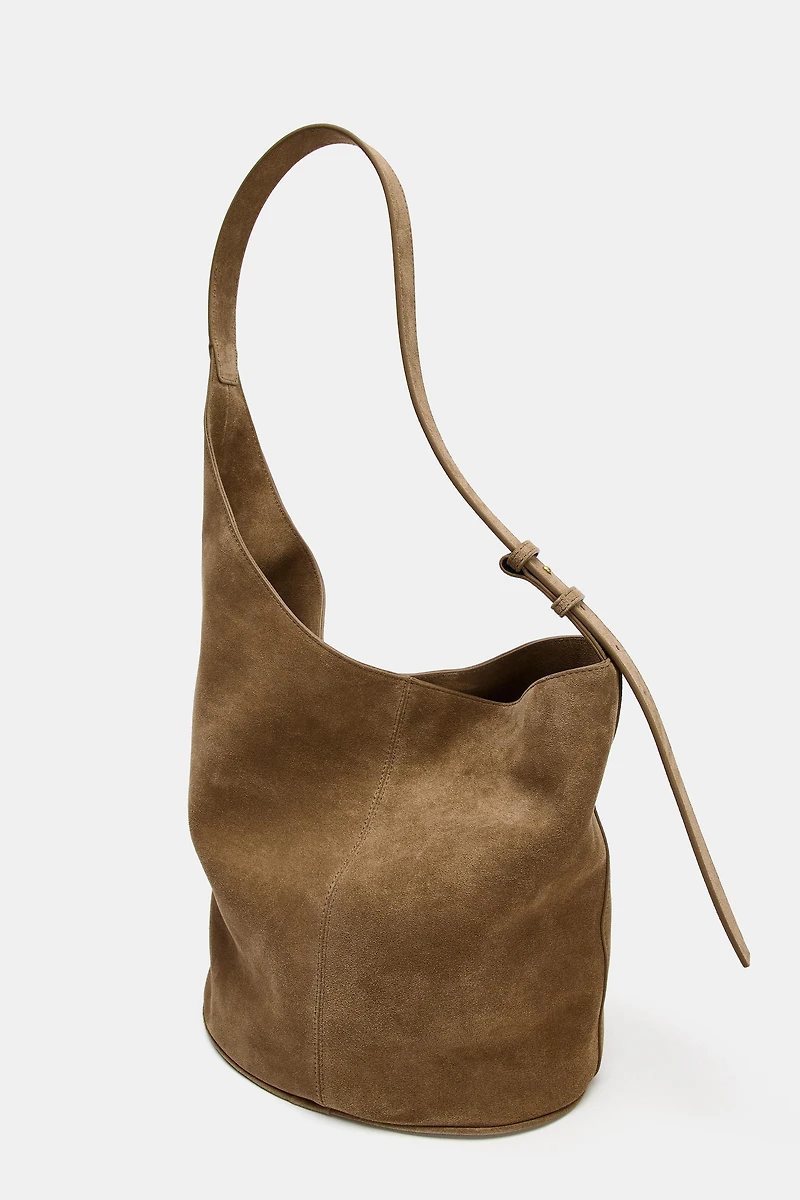 SAC SEAU EN CUIR ASYMÉTRIQUE