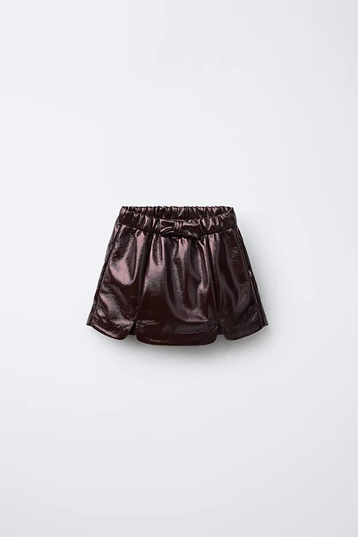 BOW PATENT LEATHER SKORT