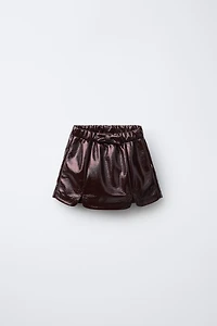 BOW PATENT LEATHER SKORT