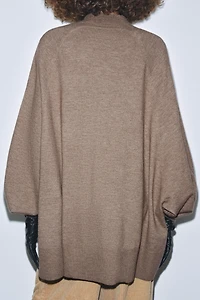 OVERSIZED MOCK NECK KNIT SWEATER