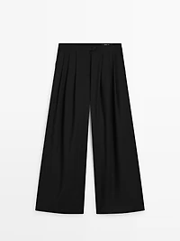 Flowing trousers with darts