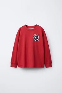 RAISED TEXT PRINT T-SHIRT