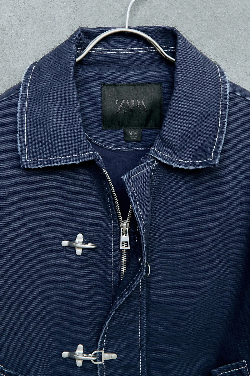 STORIESZ - TOPSTITCHED FROG FASTENING JACKET