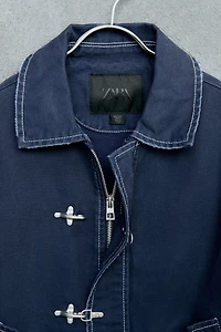 STORIESZ - TOPSTITCHED FROG FASTENING JACKET